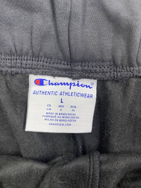 Champion Pantaloni della tuta casual con logo neri unisex L