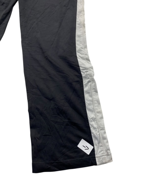 Puma Pantaloni della tuta neri con righe grigie unisex XS